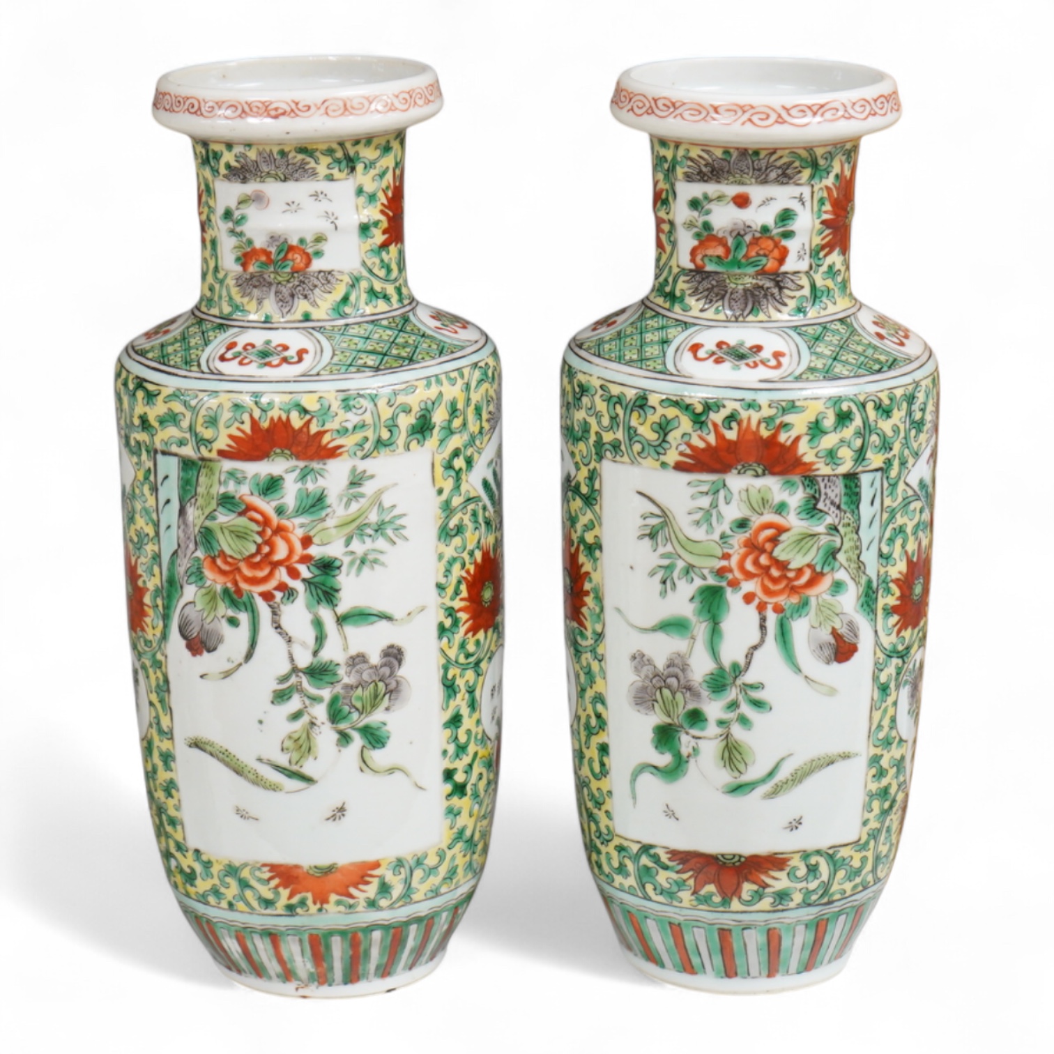A pair of Chinese famille verte rouleau vases, enamelled with flowers, 25cm high